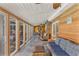 Sunroom with wicker furniture and access to the pool at 504 13Th Ave. S, North Myrtle Beach, SC 29582