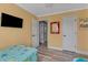 Bedroom with twin beds, access to a hallway and bathroom at 504 13Th Ave. S, North Myrtle Beach, SC 29582