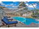 Inviting screened-in pool with lounge chairs and a shed at 504 13Th Ave. S, North Myrtle Beach, SC 29582