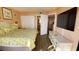 Main bedroom with king-size bed and en-suite bathroom at 7100 Ocean Blvd. N # 919, Myrtle Beach, SC 29572