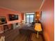 Ocean view living room, L-shaped sofa, and flat-screen TV at 7100 Ocean Blvd. N # 919, Myrtle Beach, SC 29572