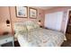 Main bedroom with king-size bed and en-suite bathroom at 7100 Ocean Blvd. N # 919, Myrtle Beach, SC 29572