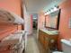 Bathroom with granite vanity and a view of the kitchen at 7100 Ocean Blvd. N # 919, Myrtle Beach, SC 29572