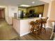Kitchen with granite countertops and breakfast bar at 7100 Ocean Blvd. N # 919, Myrtle Beach, SC 29572