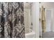 Bathroom with a shower/tub combo and patterned shower curtain at 332 Kiskadee Loop # L, Conway, SC 29526