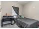 Serene bedroom with a desk and bed featuring a dark gray comforter at 332 Kiskadee Loop # L, Conway, SC 29526