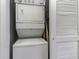Stackable washer and dryer in a closet at 332 Kiskadee Loop # L, Conway, SC 29526