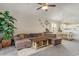 Open living and dining area with neutral tones and L-shaped sofa at 332 Kiskadee Loop # L, Conway, SC 29526