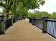Wooden boardwalk path with railings alongside a river at 332 Kiskadee Loop # L, Conway, SC 29526