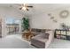 Relaxing living room, featuring an L-shaped sofa and sliding door to balcony at 332 Kiskadee Loop # L, Conway, SC 29526