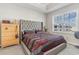 Spacious Primary bedroom with large window and plush bedding at 332 Kiskadee Loop # L, Conway, SC 29526