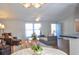 Bright dining area with table and chairs near living room at 527 Folly Estates Dr., Myrtle Beach, SC 29588