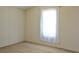 Empty bedroom with carpeted floor and a large window at 527 Folly Estates Dr., Myrtle Beach, SC 29588