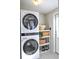 Stackable washer and dryer in a well-lit laundry room at 527 Folly Estates Dr., Myrtle Beach, SC 29588