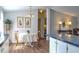 Charming dining area with table and chairs near kitchen at 527 Folly Estates Dr., Myrtle Beach, SC 29588