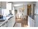 Bright kitchen with white cabinets and eat-in dining area at 527 Folly Estates Dr., Myrtle Beach, SC 29588