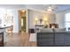 Open living room featuring a cozy seating area and hardwood floors at 527 Folly Estates Dr., Myrtle Beach, SC 29588