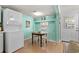 Small kitchen with white appliances and a dining area at 6001 - 1749 S Kings Hwy., Myrtle Beach, SC 29575