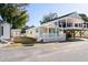 Cute beach cottage with white porch at 6001 - 1749 S Kings Hwy., Myrtle Beach, SC 29575