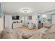 Living room with sectional sofa and adjacent kitchen at 6001 - 1749 S Kings Hwy., Myrtle Beach, SC 29575