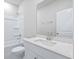 Clean bathroom, featuring a white vanity, a bathtub, and a shower at 8605 Pinnacle Cove Way, Longs, SC 29568