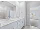 Bathroom with double vanity and access to bedroom at 8605 Pinnacle Cove Way, Longs, SC 29568