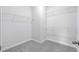 Walk-in closet with wire shelving at 8605 Pinnacle Cove Way, Longs, SC 29568