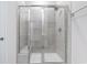 Large walk-in shower with tiled walls at 8605 Pinnacle Cove Way, Longs, SC 29568