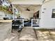 Front porch with walkway, grill, and seating area at 6001 - M26 S Kings Hwy., Myrtle Beach, SC 29575