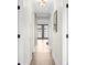 Bright hallway with light wood floors and access to backyard at 3801 N Ocean Blvd., North Myrtle Beach, SC 29582