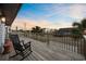 Deck with rocking chairs and street view at 3801 N Ocean Blvd., North Myrtle Beach, SC 29582