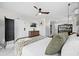 Bedroom with a queen bed, bunk bed, and dresser at 3801 N Ocean Blvd., North Myrtle Beach, SC 29582