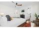 King bedroom with wood bed frame and access to bath at 3801 N Ocean Blvd., North Myrtle Beach, SC 29582