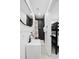 Modern bathroom with a walk-in shower and floating sink at 3801 N Ocean Blvd., North Myrtle Beach, SC 29582