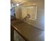 Dining room with brick flooring and large bay window at 708 Grices Ferry Ct., Mullins, SC 29574