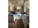 Cozy kitchen features white cabinets and blue countertops at 708 Grices Ferry Ct., Mullins, SC 29574