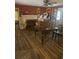 Living room with fireplace, wood flooring and lots of natural light at 708 Grices Ferry Ct., Mullins, SC 29574