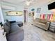 Beach-themed living room with sectional sofa and TV at 6001 - 1781 S Kings Hwy., Myrtle Beach, SC 29575
