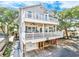Two-story beach home with large deck and covered parking at 6001 - 1123 S Kings Hwy., Myrtle Beach, SC 29575