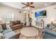 Spacious living room with hardwood floors and comfy sofas at 6001 - 1123 S Kings Hwy., Myrtle Beach, SC 29575