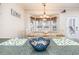 Charming dining area with a table for six, situated near a large bay window at 6001 - 1123 S Kings Hwy., Myrtle Beach, SC 29575