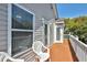 Deck with white railing and chairs overlooking neighborhood at 6001 - 1123 S Kings Hwy., Myrtle Beach, SC 29575