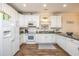 Well-equipped kitchen with white cabinets, modern appliances, and ample counter space at 6001 - 1123 S Kings Hwy., Myrtle Beach, SC 29575