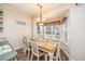 Bright dining area with bay window and seating for six at 6001 - 1123 S Kings Hwy., Myrtle Beach, SC 29575