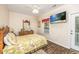 Comfortable bedroom with a queen bed, wood floors, and private access to balcony at 6001 - 1123 S Kings Hwy., Myrtle Beach, SC 29575