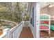 Deck with wooden flooring and white railing, providing views of the surrounding area at 6001 - 1123 S Kings Hwy., Myrtle Beach, SC 29575