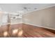 Spacious living room with hardwood floors and kitchen views at 336 Kiskadee Loop # B, Conway, SC 29526