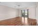 Living room with hardwood floors, water views, and ceiling fan at 336 Kiskadee Loop # B, Conway, SC 29526