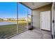 Screened porch with pond, community, and door access at 336 Kiskadee Loop # B, Conway, SC 29526