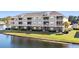 Building exterior with lake view and patio at 336 Kiskadee Loop # B, Conway, SC 29526